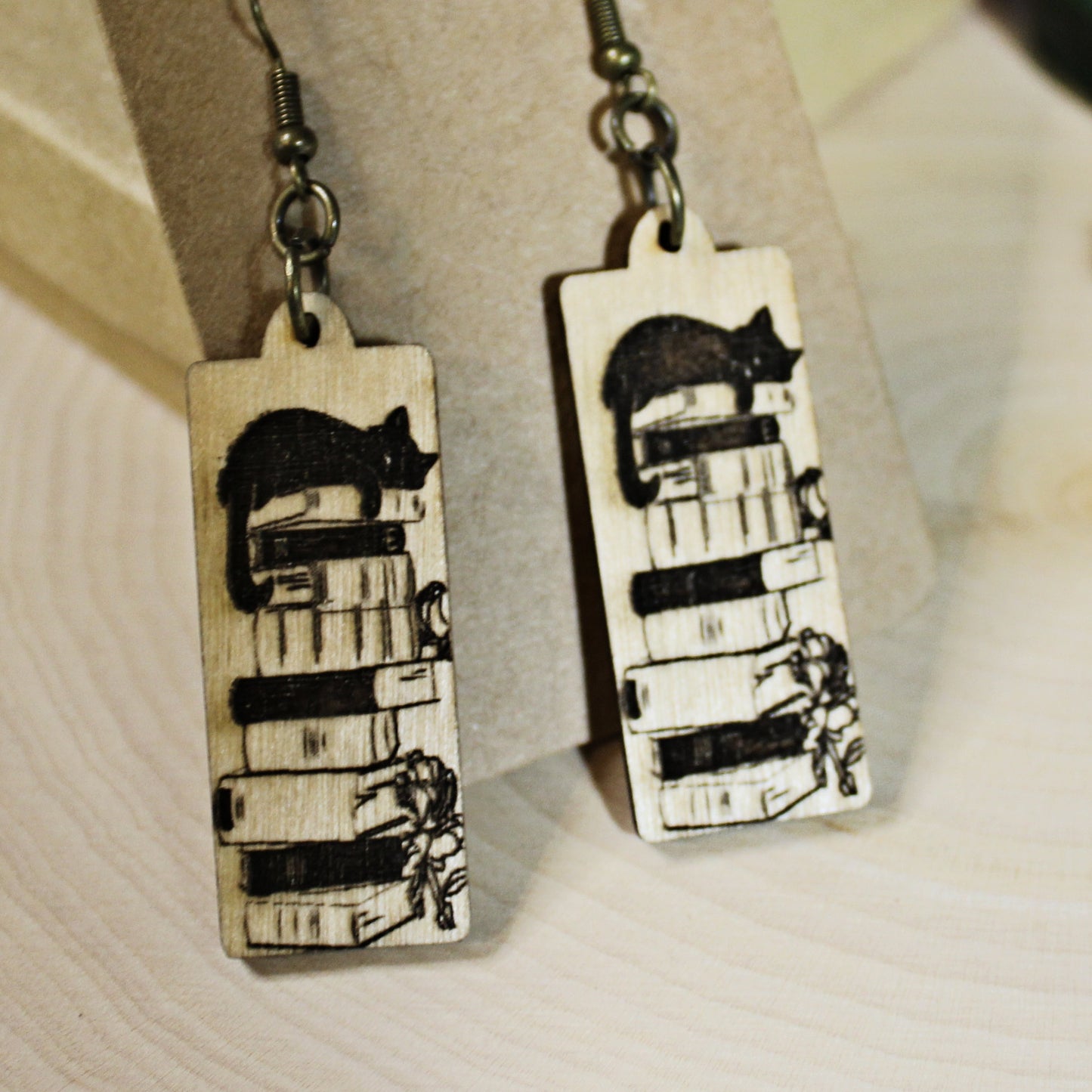 Cat on book stack wooden earrings