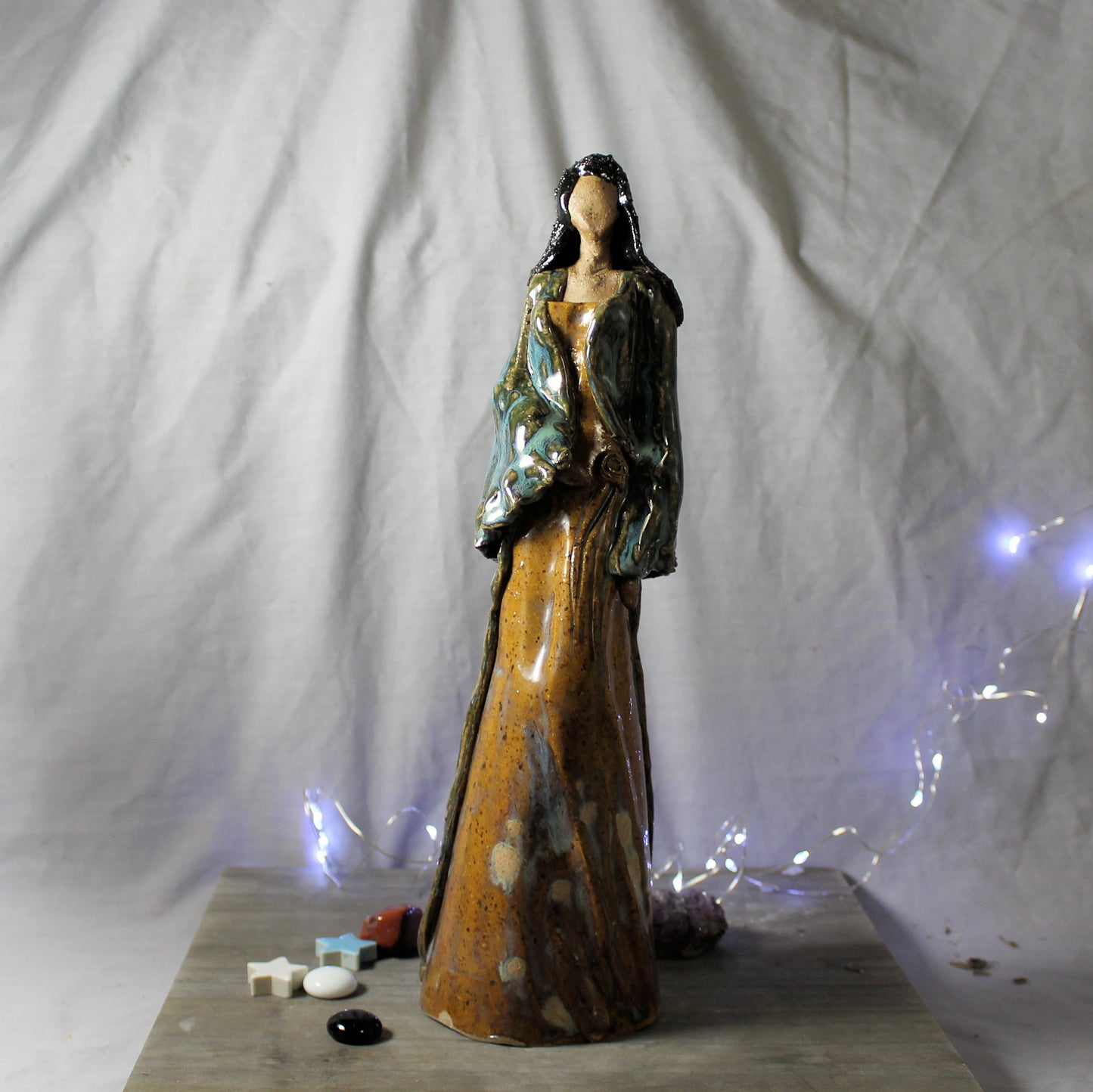 Robed Woman Figure