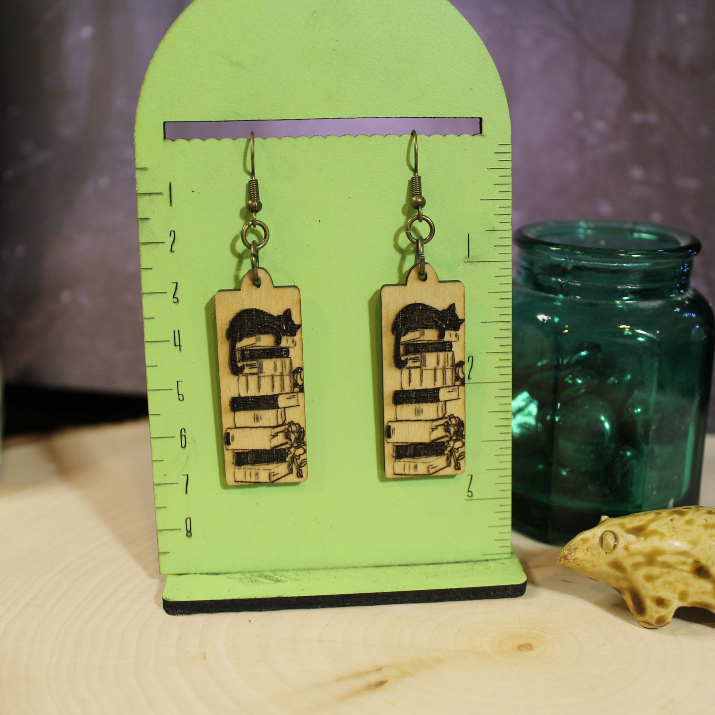 Cat on book stack wooden earrings