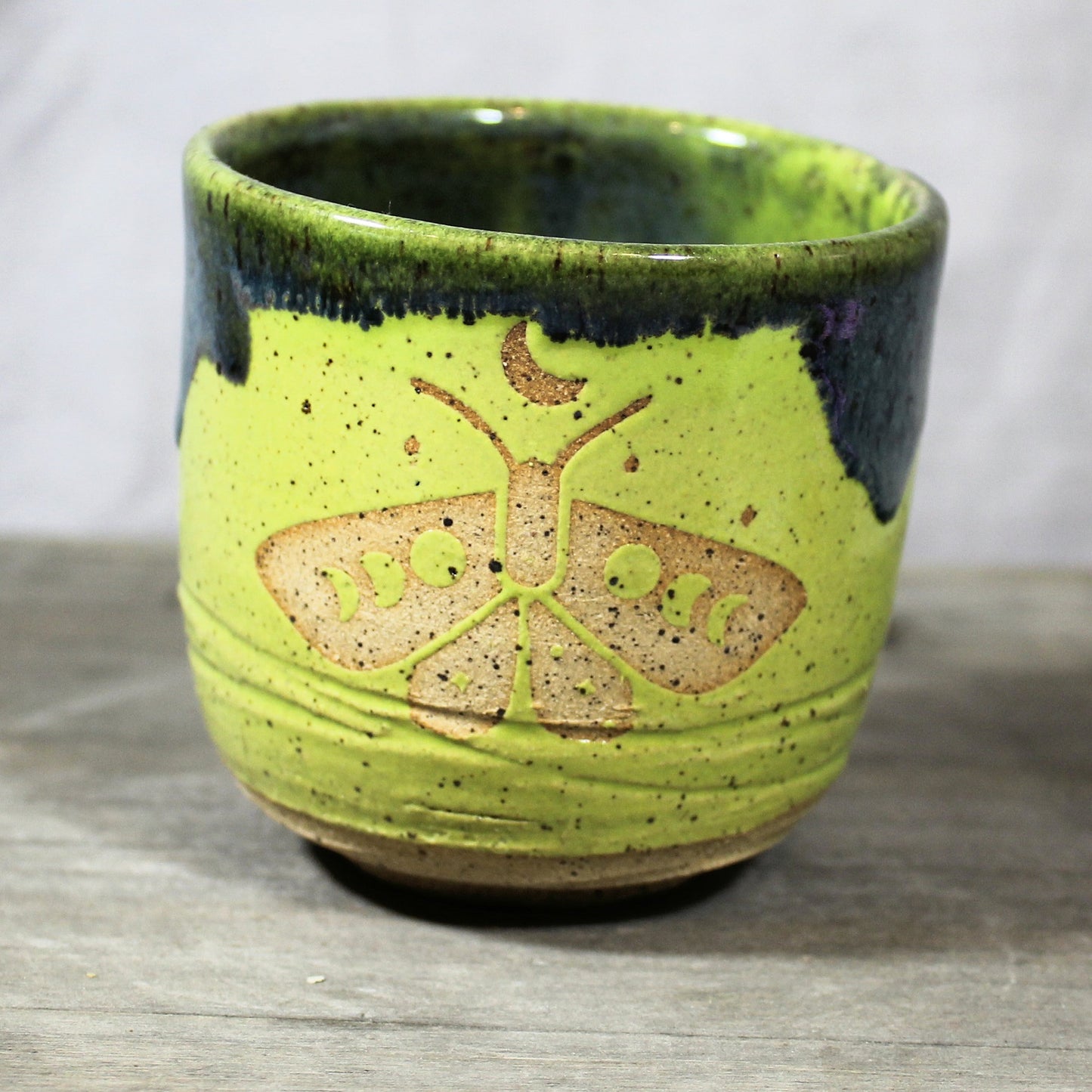 Moon Moth ceramic whiskey sipper/small cup